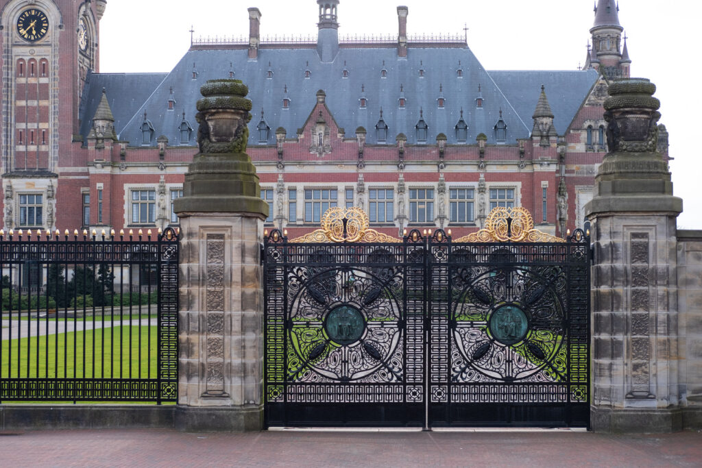 front elevation of the Peace Palace as soon through and above elaborately adorned gates